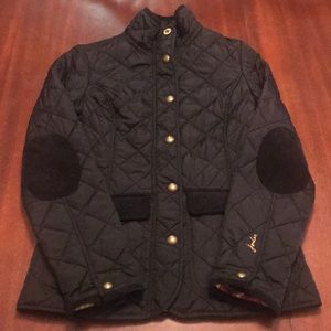 Black quilted jacket with corduroy detailing
